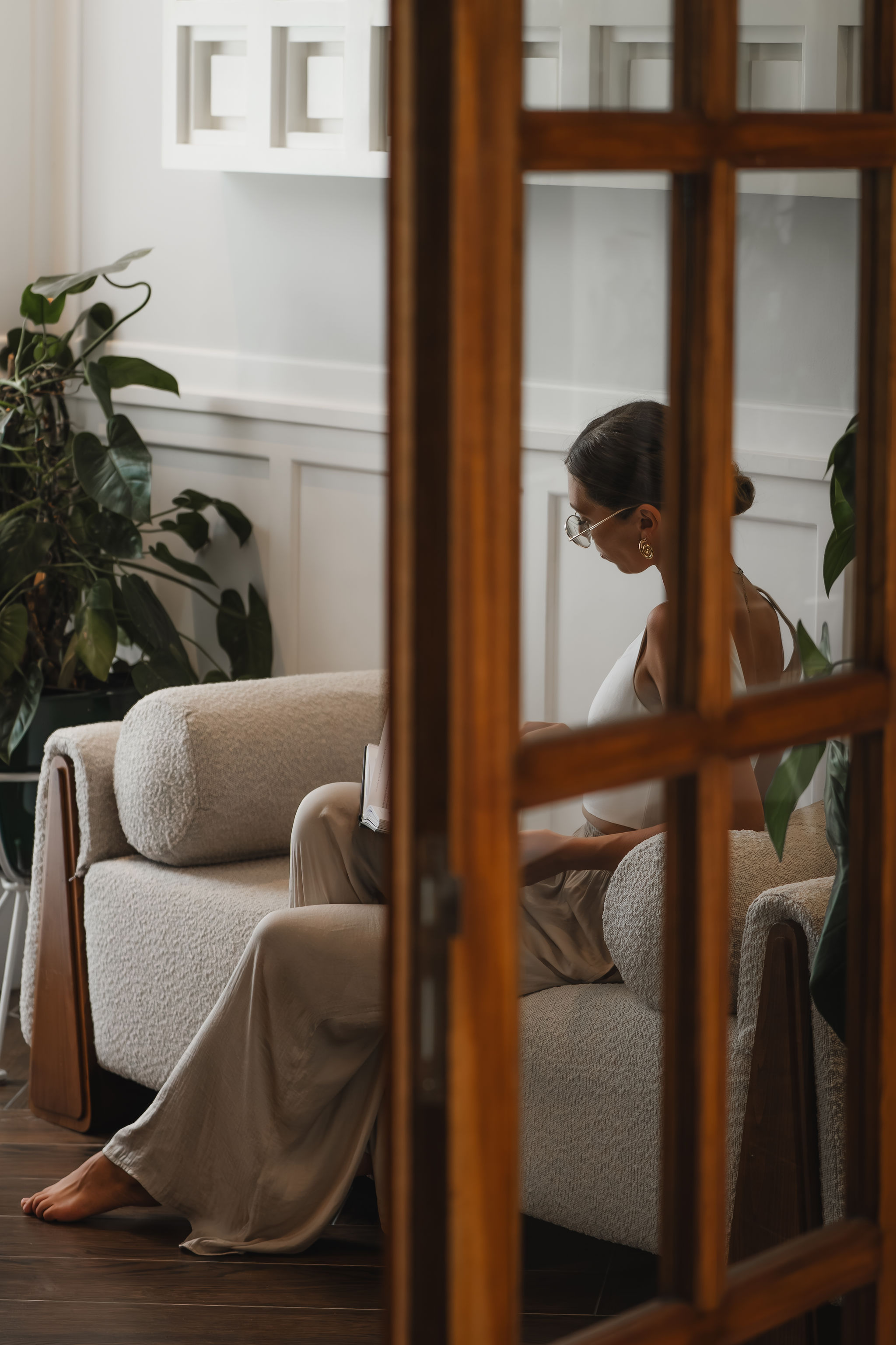 Reading in the living room at Mayfair Place